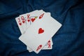 Deck of cards with Ace of Hearts at front in denim background. Royalty Free Stock Photo