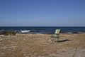 Deck chair on beach in a sunny summer day in Apulia  Italy Royalty Free Stock Photo