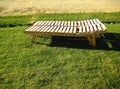 Deck chair made of wooden boards Royalty Free Stock Photo