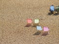 Deck chairs on Brighton Beach view below Royalty Free Stock Photo