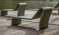Deck chairs in a public park on the street. Bench in the city. Royalty Free Stock Photo