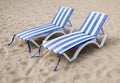 Deck chairs on the sand Royalty Free Stock Photo