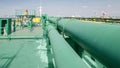 Green Oil and gas pipelines on stored tanker ship