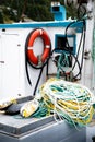 Deck of a East coast fishing boat with safety gear and fishing ropes in Newfoundland.