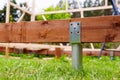 Deck Foundation Construction with Ground Screw and Wood Frame Support System. Royalty Free Stock Photo