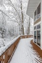 Deck on Home in Snowy Woods in Winter Royalty Free Stock Photo