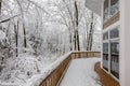 Deck on Home in Snowy Woods in Winter Royalty Free Stock Photo