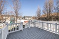 Deck of a house with a view of a playground in the backyard Royalty Free Stock Photo