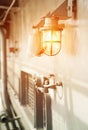 Deck lamp on ship in protective cage Royalty Free Stock Photo