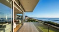 Serene deck of a luxury coastal residence with a stunning panoramic ocean view and beautiful natural light Royalty Free Stock Photo