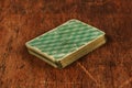 Deck of old cards on wooden table Royalty Free Stock Photo
