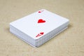 Deck of playing cards with ace hearts card on top Royalty Free Stock Photo