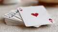 A deck of playing cards with the ace of hearts on top. Royalty Free Stock Photo