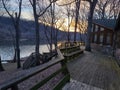 Deck porch railing cabin river sunset stairs Royalty Free Stock Photo