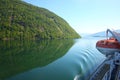 Deck of a ship & lifeboat as it cruises down the Sognefjord or Sognefjorden, Norway. Royalty Free Stock Photo