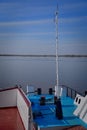 The deck of the ship is prepared for river cruises. Light mast and bollards on the deck of a moored barge.