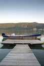 Deck to boat on river shore Royalty Free Stock Photo
