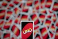 Deck of Uno game cards scattered all over on a table. American card game. Royalty Free Stock Photo