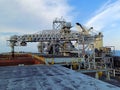 Deck View of Coal Cargo Loading Using Floating Loading Facility Royalty Free Stock Photo