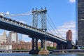 The deck and west tower of the Manhattan bridge with Lower Manhattan in the background Royalty Free Stock Photo