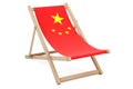 Deckchair with Chinese flag. China vacation, tours, travel packages, concept. 3D rendering Royalty Free Stock Photo