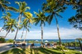 Deckchair lounger with palm trees and infinity pool in Barahona Dominican Republic Royalty Free Stock Photo