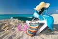 Deckchair with sun accessories on the Caribbean be