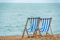 Deckchairs on beach