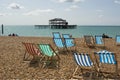 Deckchairs on beach at Brighton, England Royalty Free Stock Photo