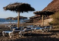 Deckchairs on a Lonely Desert Beach