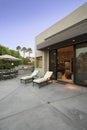 Deckchairs outside modern home