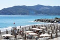 Deckchairs and Parasols on Sand and Shingle Beach, Savona, Liguria, Italy