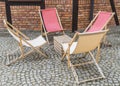 Deckchairs on street Royalty Free Stock Photo