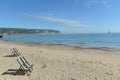 Deckchairs and view over bay from Swanage beach