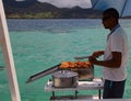 Deckhand cooking on a yacht