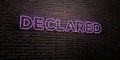 DECLARED -Realistic Neon Sign on Brick Wall background - 3D rendered royalty free stock image