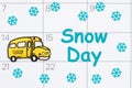 Declaring a snow day message on a calendar with a school bus for your school closed message Royalty Free Stock Photo