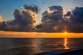 Decline of cloud over quiet sea Royalty Free Stock Photo