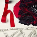 Deconstructed red and black millinery materials Royalty Free Stock Photo