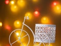 a small pink Bicycle against a background of blurred lights Royalty Free Stock Photo