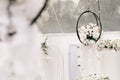 Decor element in the form of hanging white orchids for the wedding ceremony Royalty Free Stock Photo