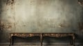 The decor is from an old gray dirty wall and an antique rusty table with a wooden floor. Antique decor and furniture minimalism.