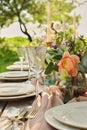 wedding decorated table, decor wedding dinner in nature in the garden Royalty Free Stock Photo