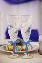 Decor of a wedding party. Wedding table decoration in a restaurant. Glasses, drinks, food. Festive decoration of the interior Royalty Free Stock Photo