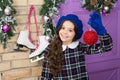 Decorate everything around. Festive atmosphere christmas day. Girl hold ball christmas tree ornaments. Buy decorations