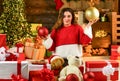 Decorate home. Xmas spirit. Santa is near. Happy girl at christmas tree. Family holiday celebration. Happy new year Royalty Free Stock Photo