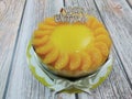 Decorate the orange cake with orange slices to add beauty.