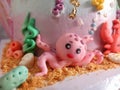 Decorate the tart cake with octopus-shaped fondant Royalty Free Stock Photo