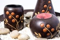 Decorated african centerpiece with rocks and a candle