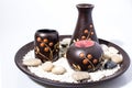 Decorated african centerpiece with rocks and a candle